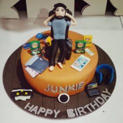 Junkie Guy Theme Fondant Cake